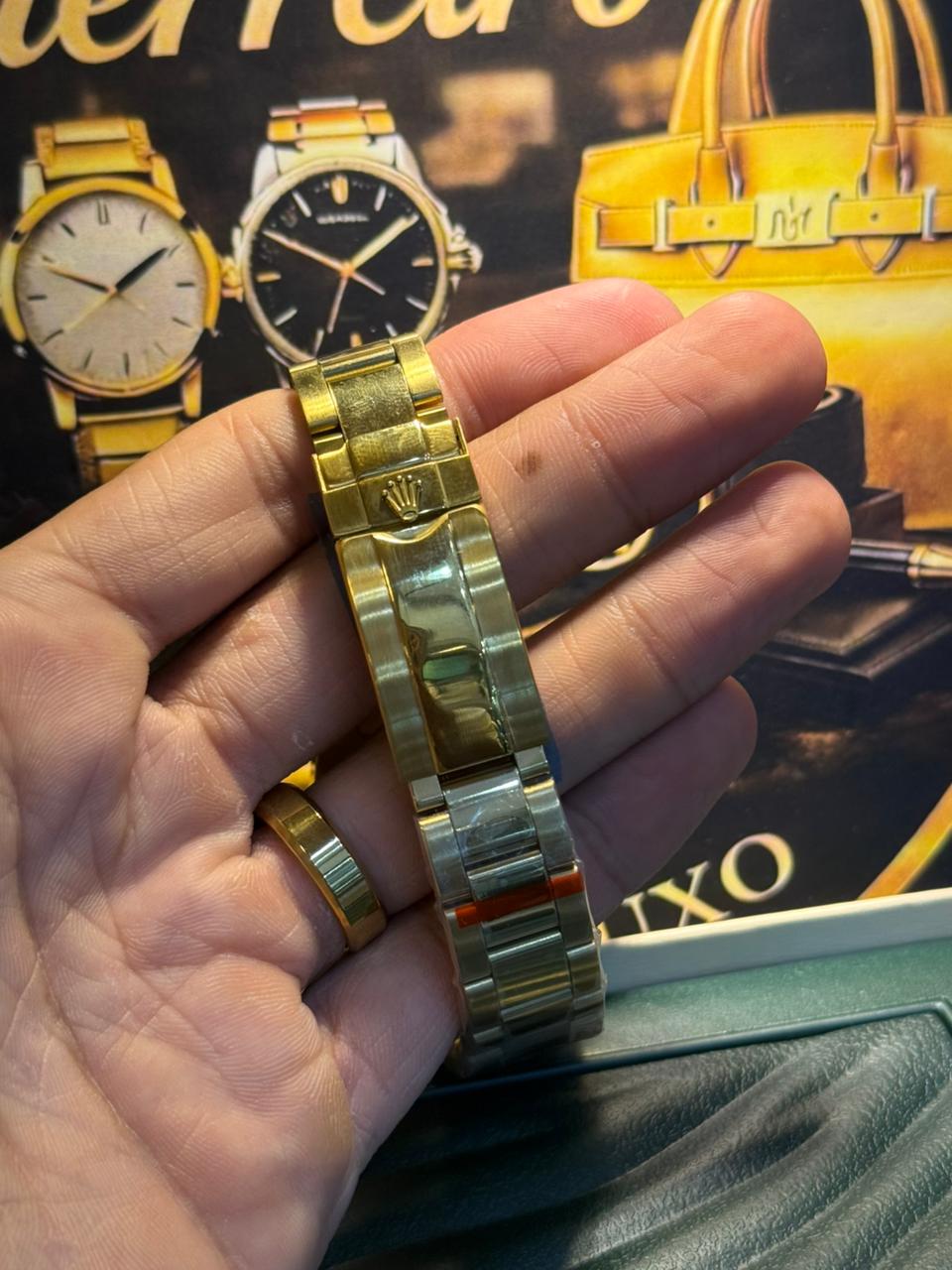 Rolex Submariner Date – Azul / Ouro